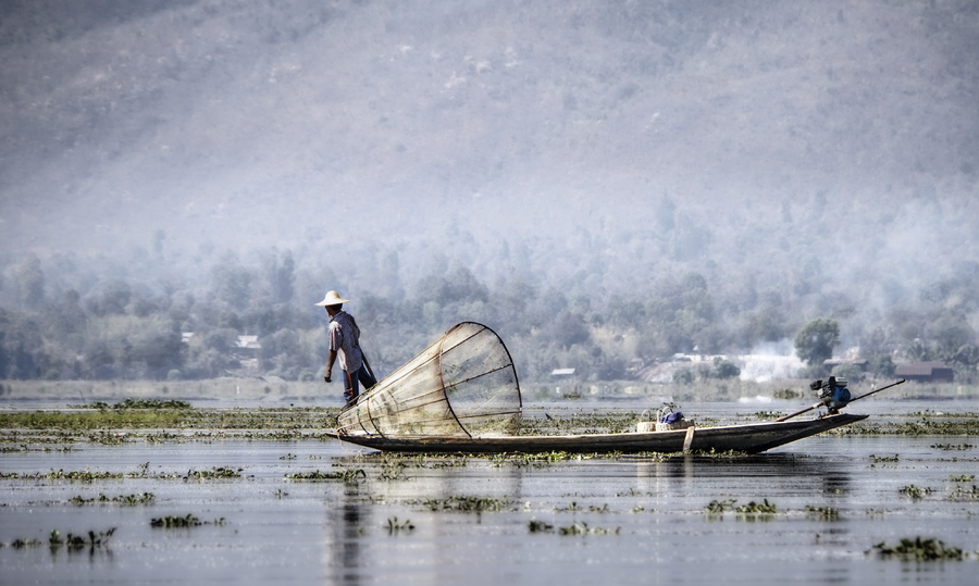 40- Fisherman with Cone Net