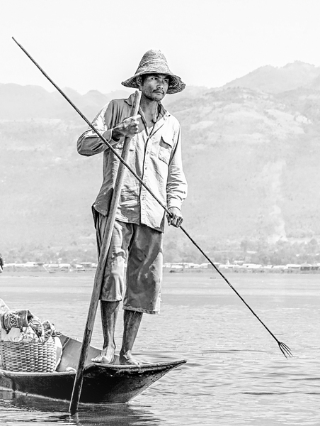 116- Fisherman Holding Fish Gig