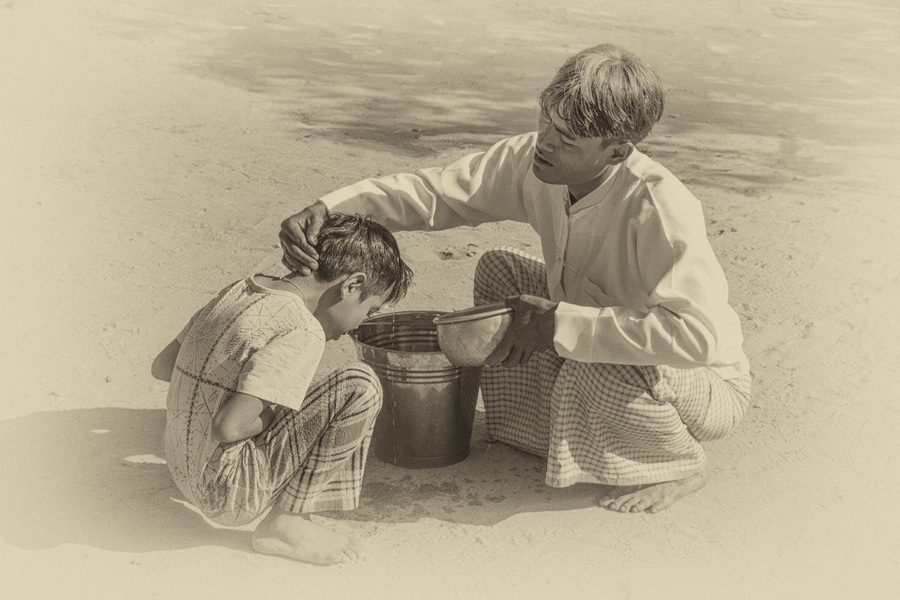 174- Father Washes Novitiate's Hair