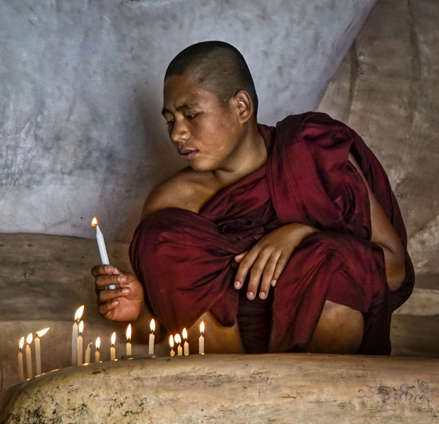 100- Monk Lights Candles By Dying Buddha